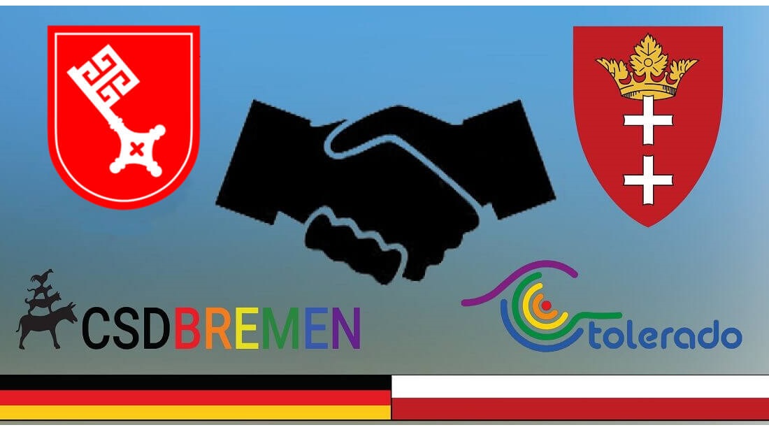 Banner zur Städtepartnerschaft Bremen/Danzig, dass die Wappen der beiden Städte und zwei sich schüttelnde Hände zeigt.